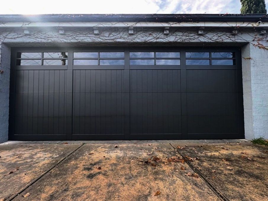 Charcoal garage door with window panels